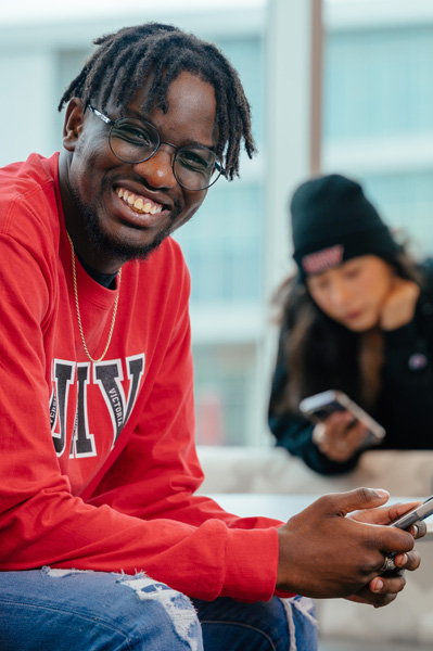 Two students sitting in the library