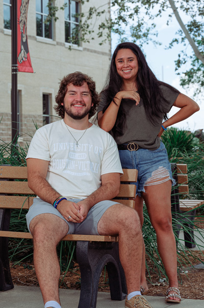 female and male student outside