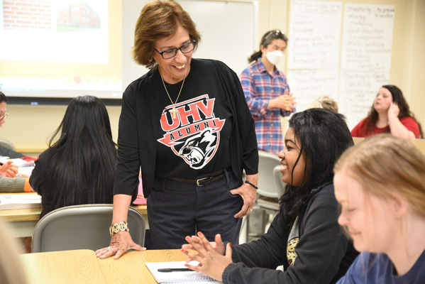 Instructor speaking to a student