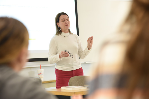 A female instructor teaching class