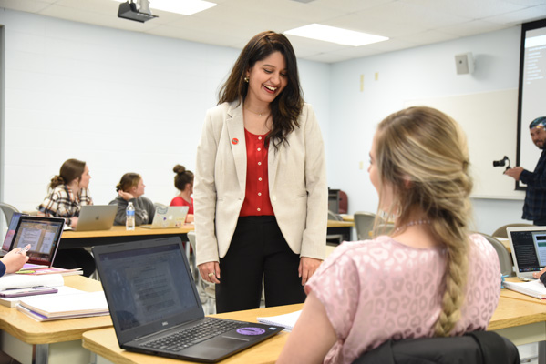 A female instructor teaching class