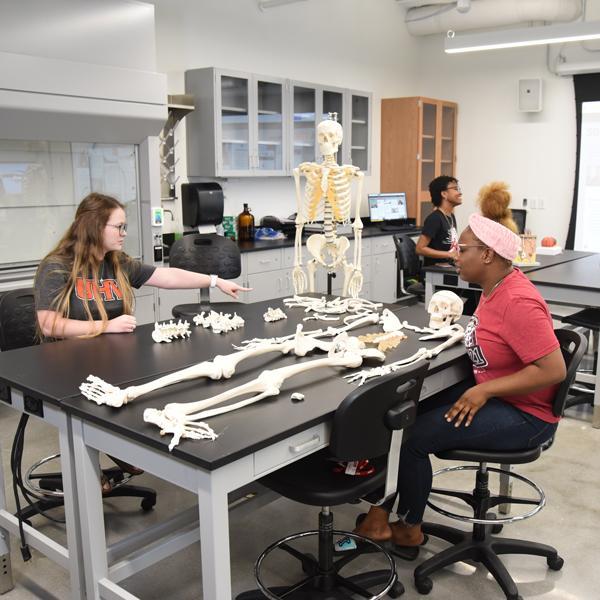 Female students with skeleton