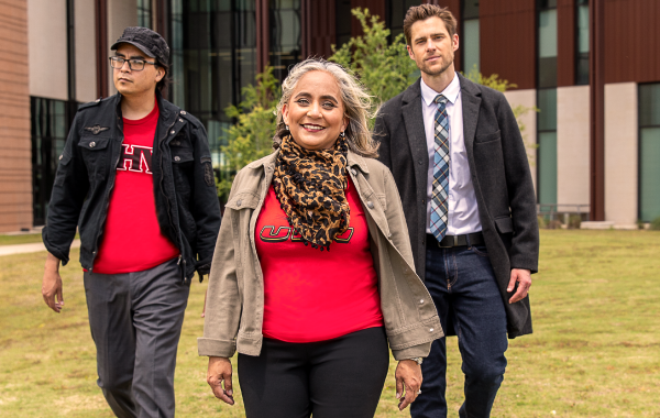 Three Professors walking outside