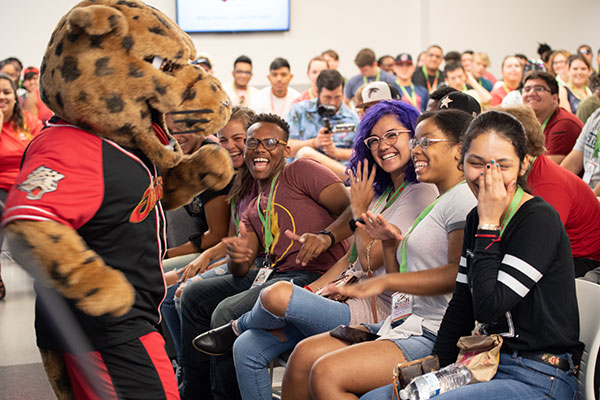 jaX interacting with new students at UHV Jaguar Journey Kickoff event.