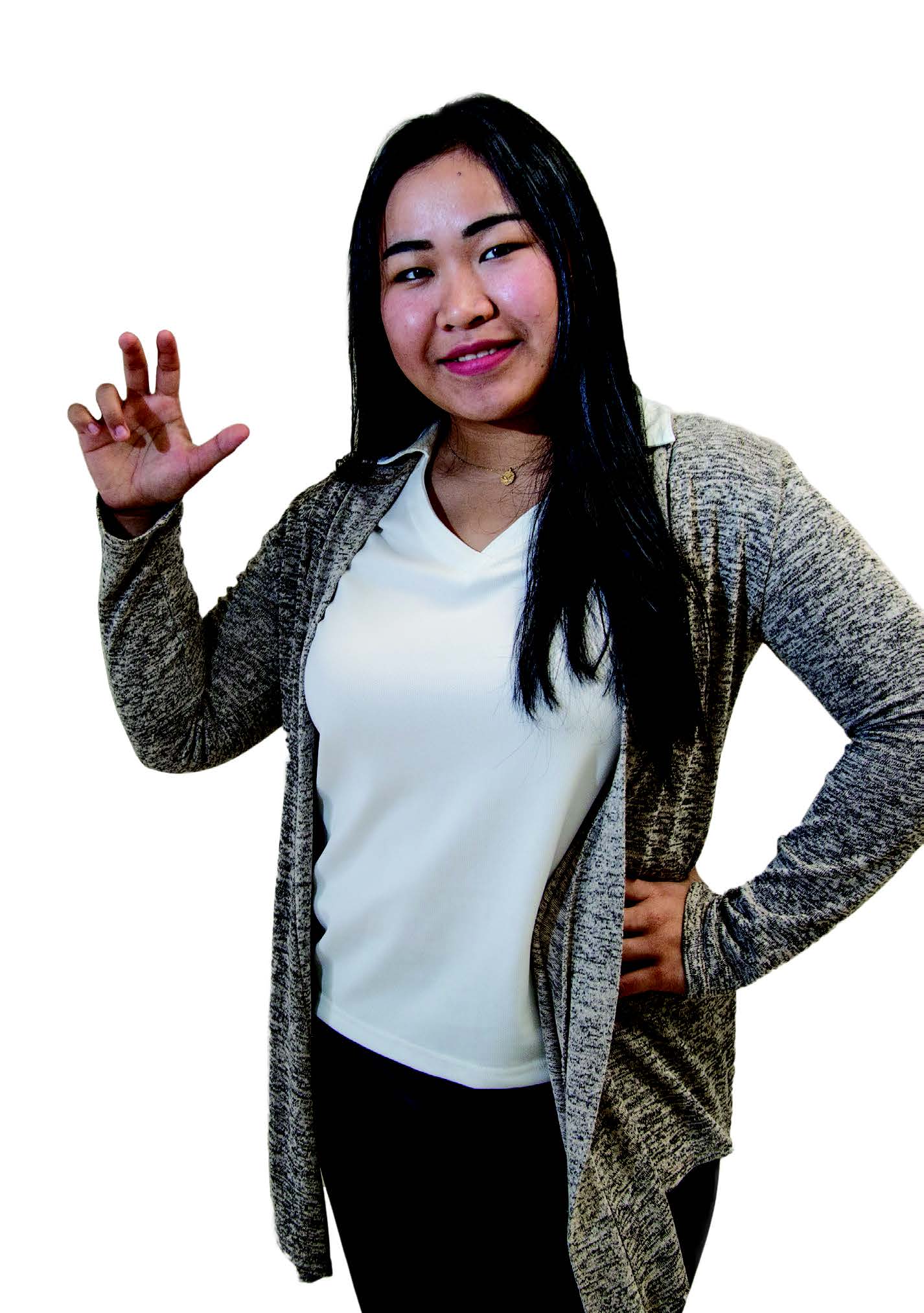 female student making university hand sign.