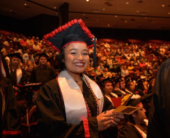 Student Smiling at Ceremony