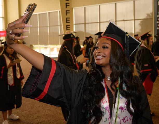 Graduating Student taking selfie
