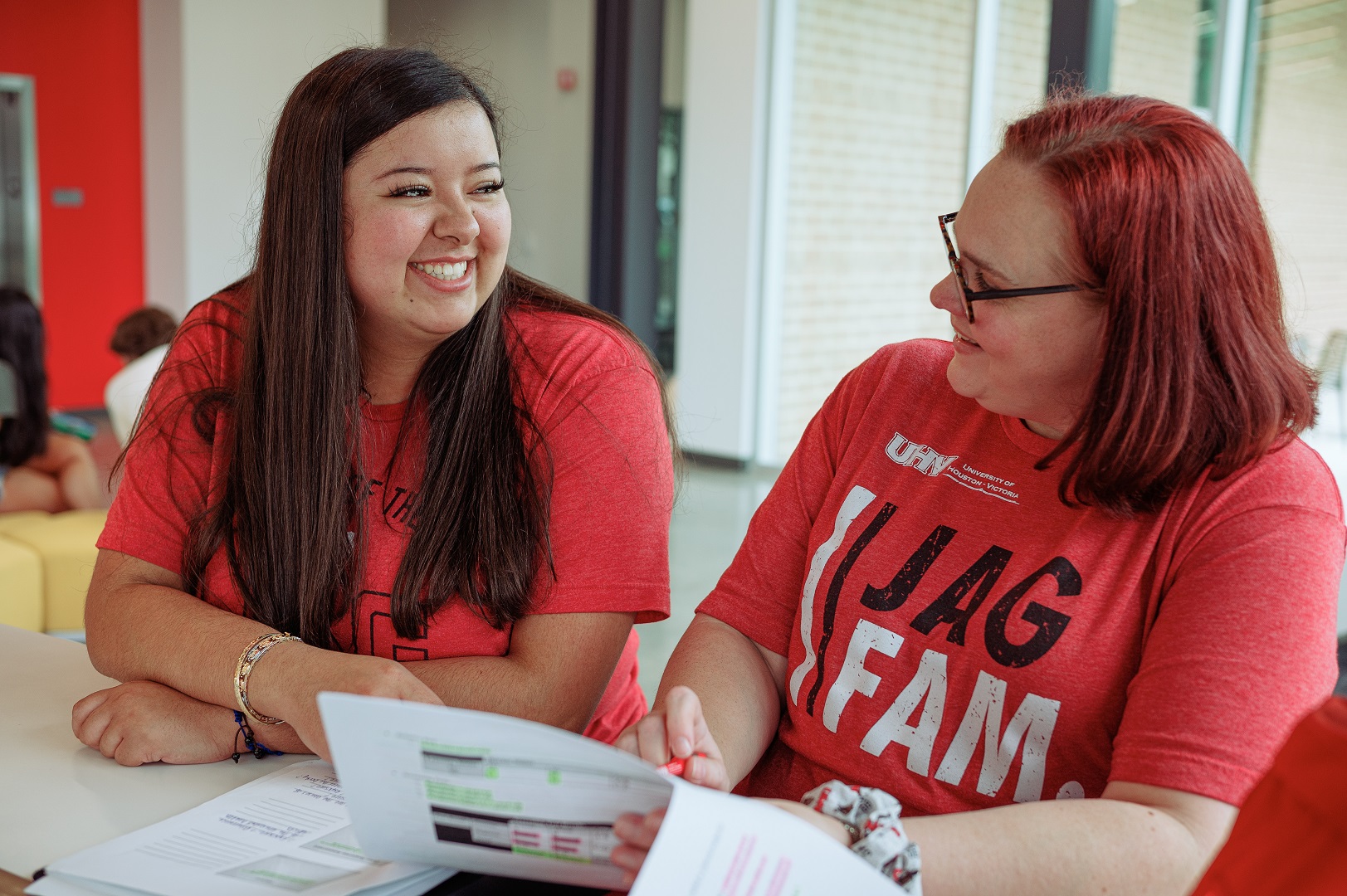 Students Talking to each other at table