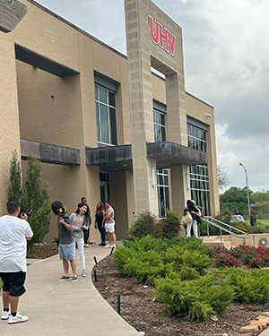 Group outside University West building