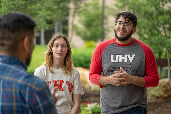 2 students smiling