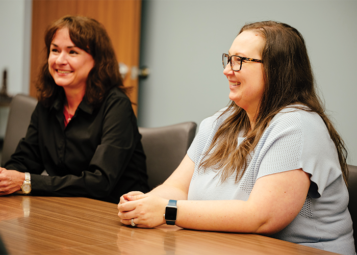 Employees discussing Benefits and Retirement