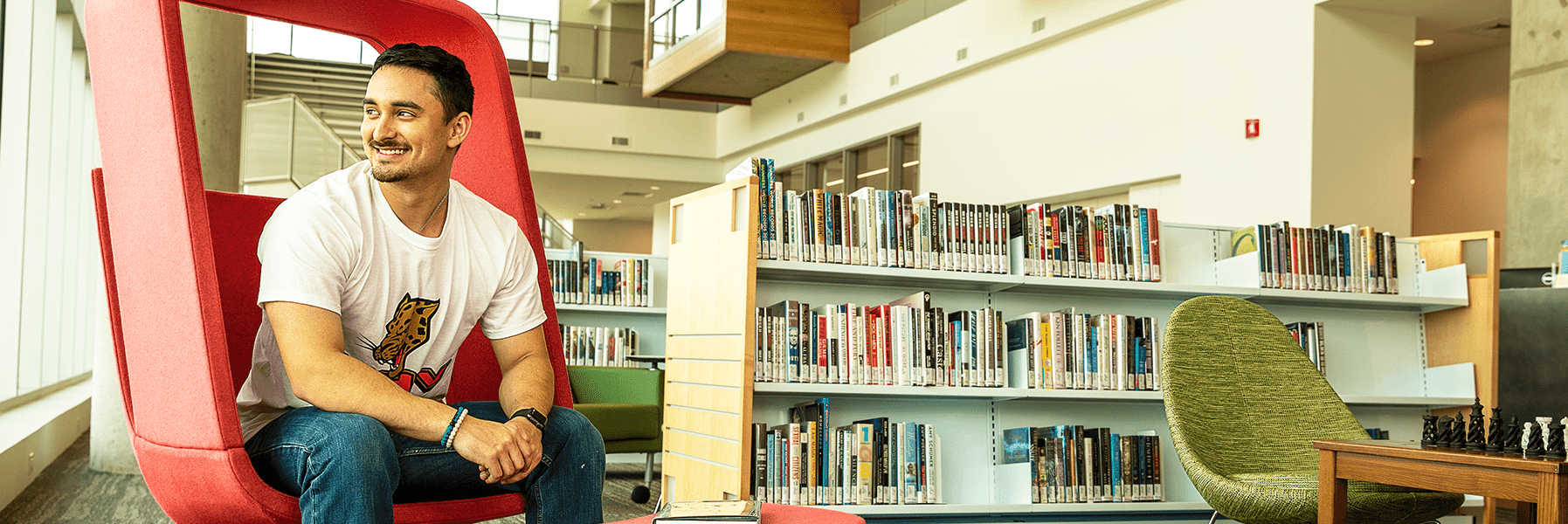 A male student in the UHV Library