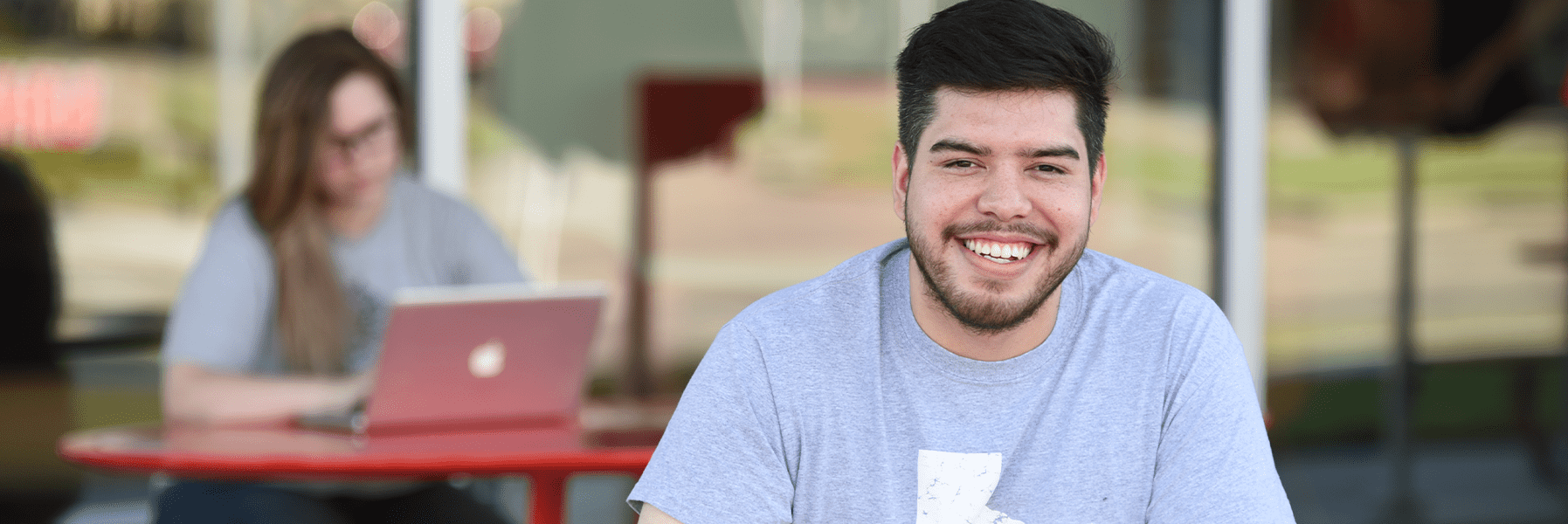 Student smiling for camera