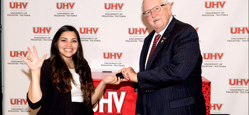 Student receives class ring in ring ceremony