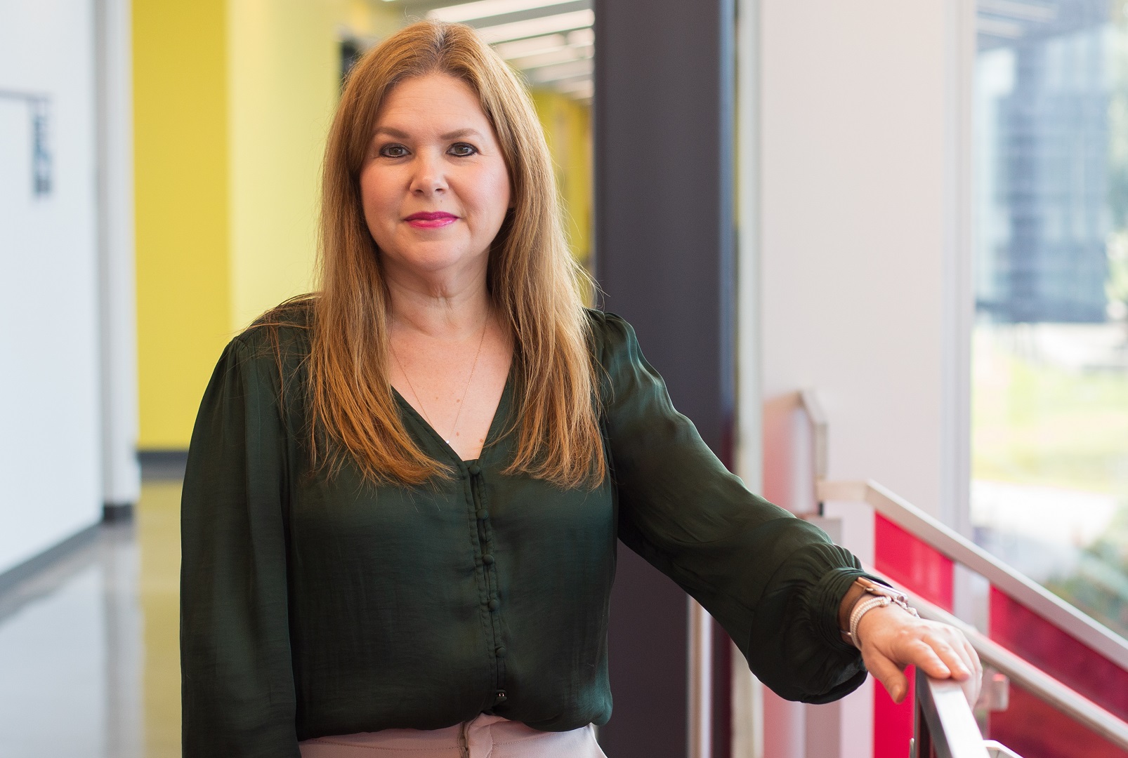 UHV mathematics lecturer Amy Cuevas stands for a portrait inside University South.