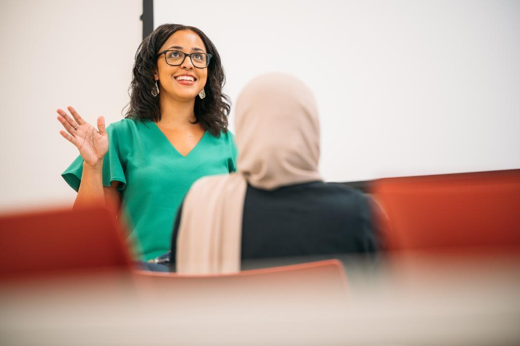 School psychology faculty teaching in a classroom.