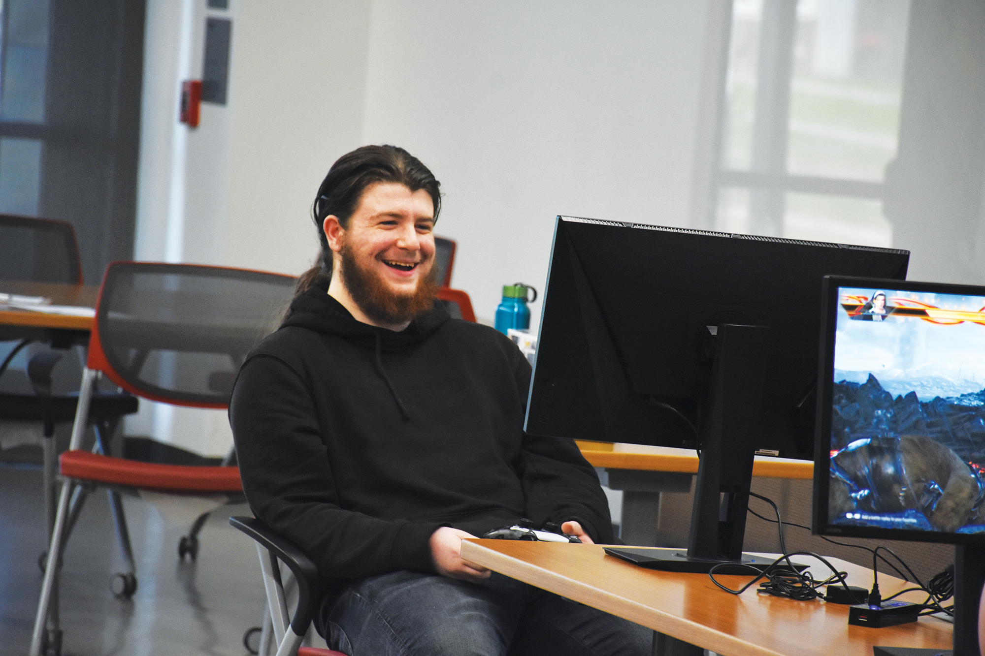 UHV junior Marshal Mason smiles as he plays in the tournament during a Jaguar eSports Club meeting Feb. 23 at University South.