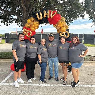 The Velazquez siblings stand with their parents during UHV Family Weekend.