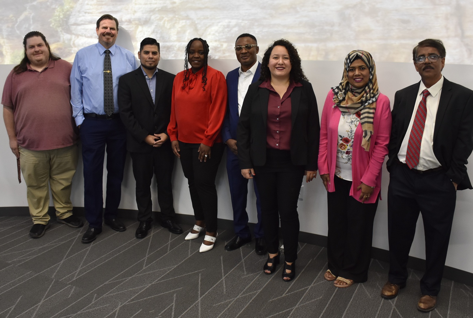 Biology Graduates Fall 2024. Pictured are Frank Jalufka, Daniel White, Humberto Hernandez, Rita Wallace, Rotimi Sowemimo, Tania Sesar, Trisha Sadia Muahmud, and Hashi Ehsan.