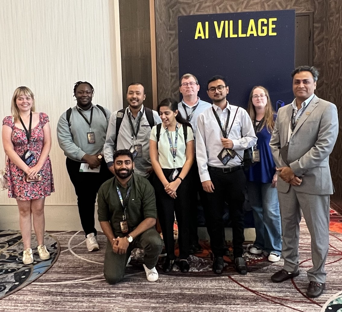 A group of University of Houston-Victoria computer science students pose for a picture at the DEF CON 2023 conference in Las Vegas in August.