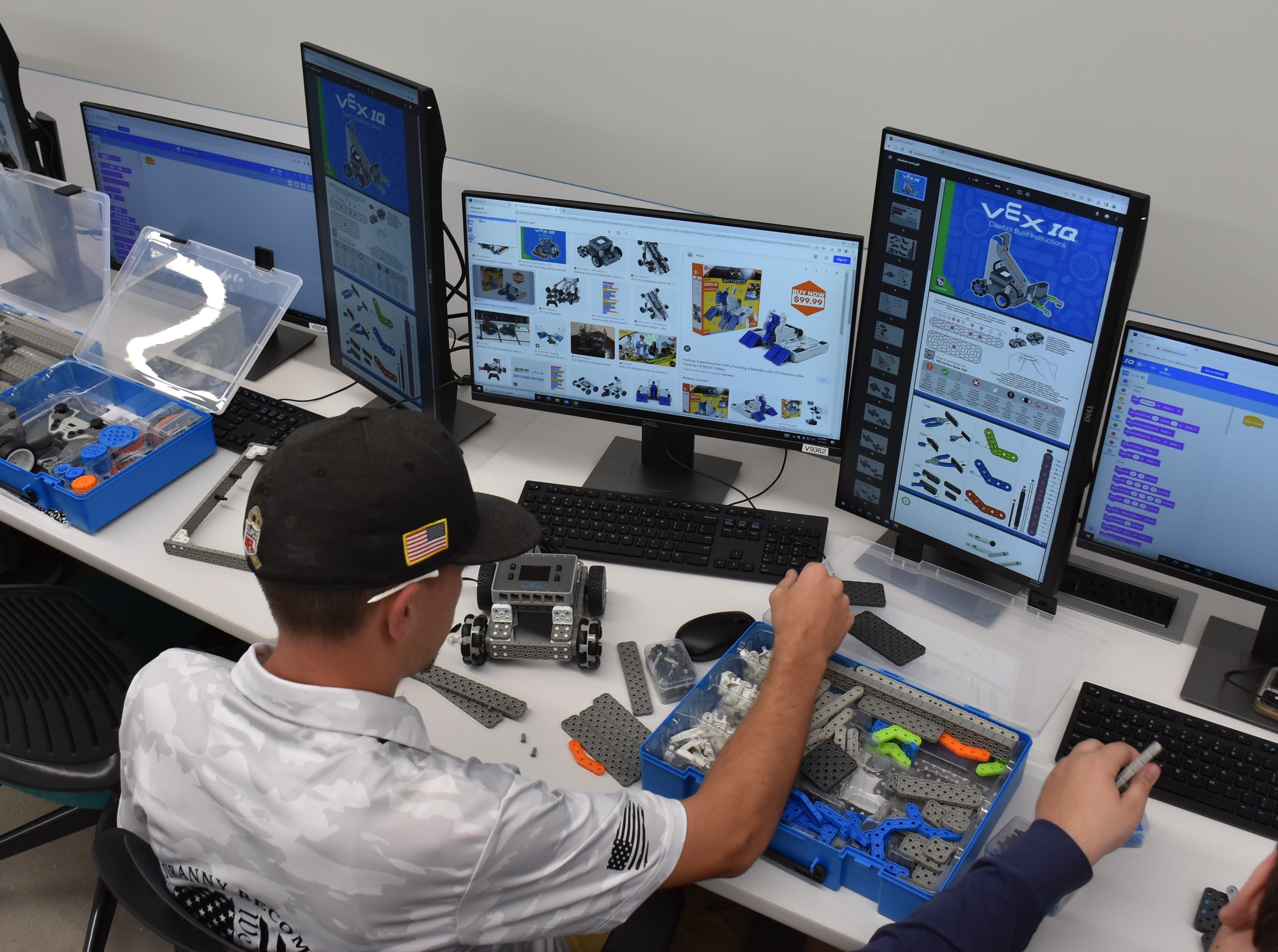 High school students work on a project in Robotics class