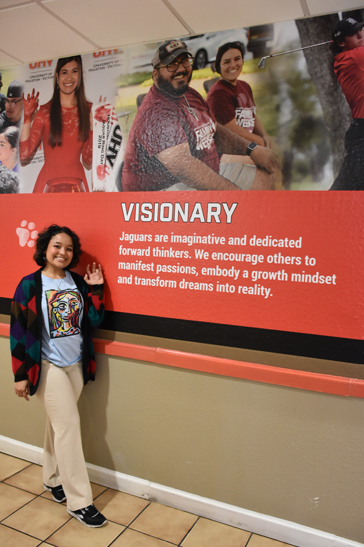 Tiarah Figueroa, the 2021-2022 UHV Student Government Association president, stands next to the 