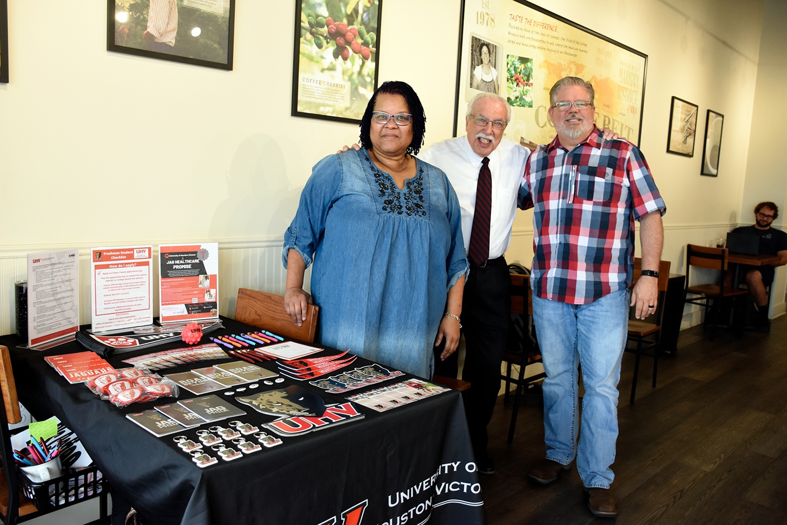 From left, Tammy Steele, UHV admissions counselor, Gary Moses and Clayton Rhodes during the jaX Impact event to raise awareness for UHV, June 2024.