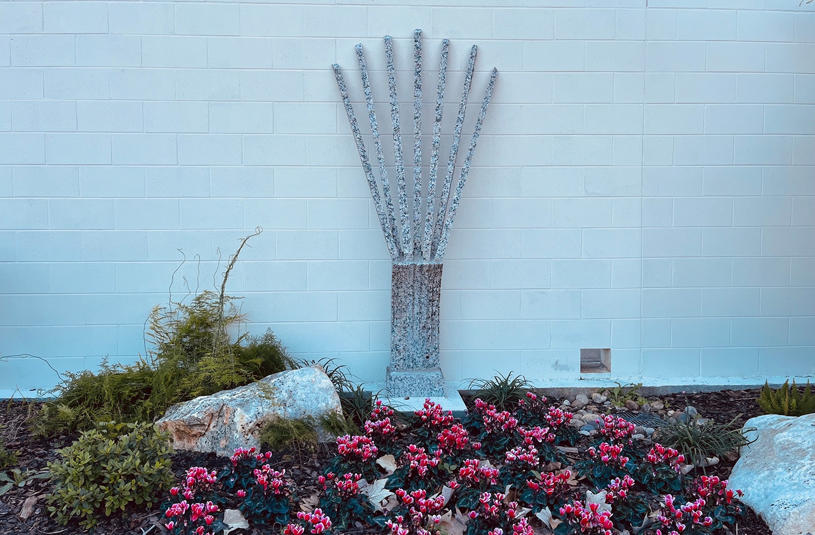 New art piece titled 'the Lotus' by Jesus Bautista Moroles, installed in UHV’s Kay’s Grove memorial garden.